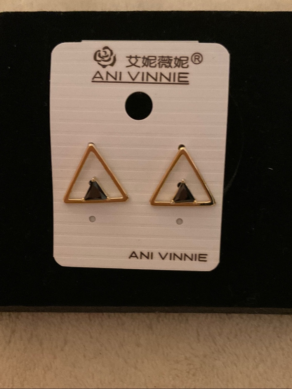 Gold Triangle Stud Earrings with Black Accent